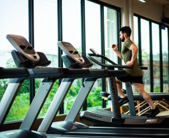 man running on treadmill